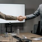people sealing a deal